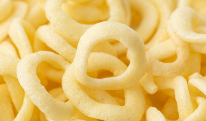 Onion ring chips as a background.