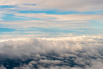 Aerial view of clouds out of my airplane window