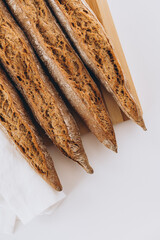 french baguette on a wooden board