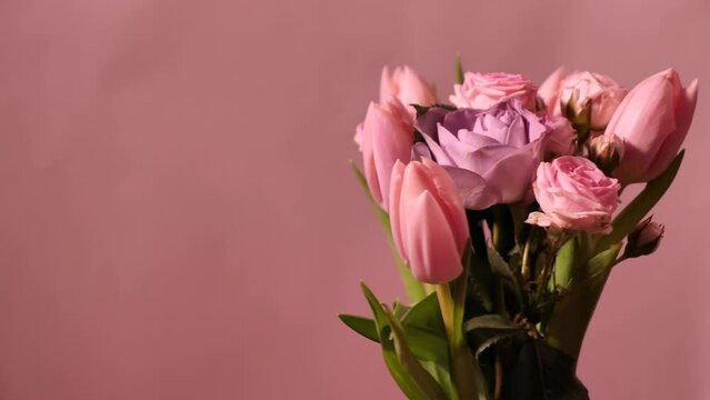 Bouquet of pink flowers on the background