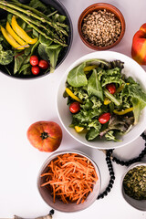 Fresh vegetables, spring mix salad, and toppings
