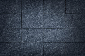 Fototapeta premium Dark grey stone / black slate stone background or texture