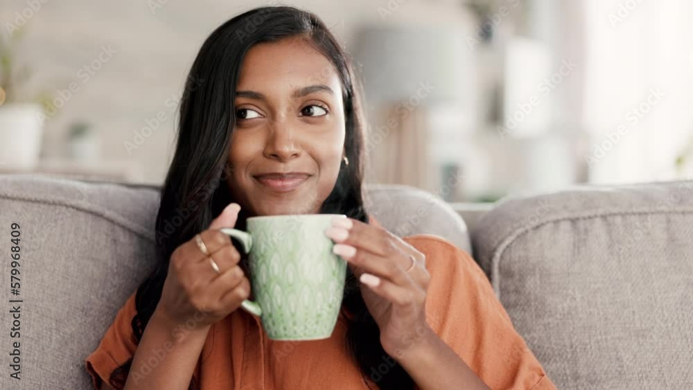 Poster Coffee, happy indian woman and morning drink feeling calm and relax thinking on living room sofa. Tea smell, lounge and aroma in home with young person with happiness, smile and peace from gratitude