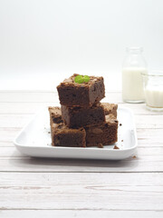 Delicious homemade brownies on white background 