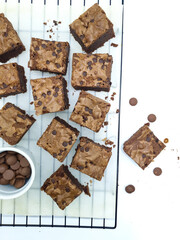 Delicious homemade brownies on white background 