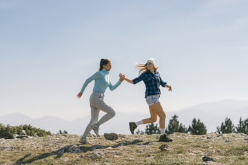 Two girls running