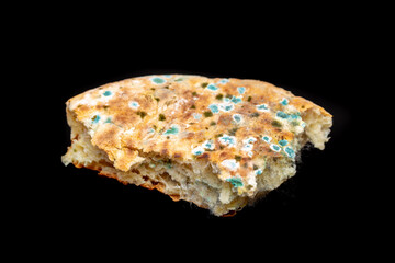 Mold on bread close-up macro. Mold on food. Fluffy mold spores as a background or texture. Mold fungus. Abstract background with copy space.