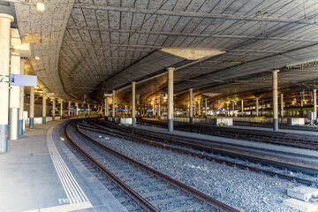 Obraz premium Subway railway station with tracks, platforms and columns of Swiss City of Bern on a winter day. Photo taken February 21st, 2023, Bern, Switzerland.