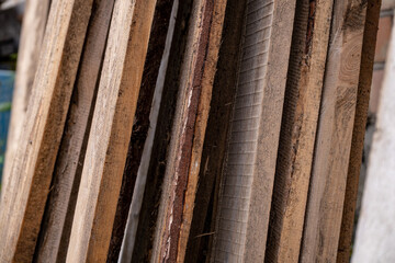 Wooden boards in a warehouse, close-up, selective focus