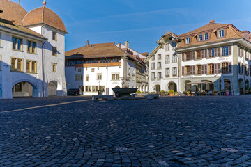 Fototapeta premium Old town of City of Thun with Town Hall Square on a sunny winter day. Photo taken February 21st, 2023, Thun, Switzerland.