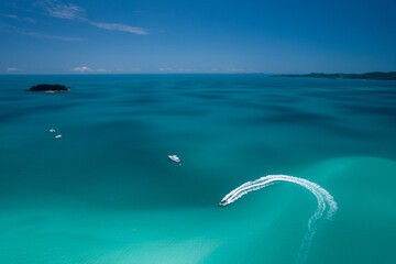 Aerial view of a boat at beautiful Whitehaven Beach in the Whitsundays