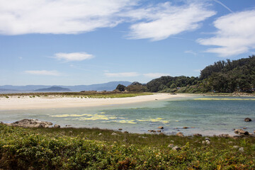 beach with crystal clear waters and fine white sand on the Cies Islands, in Galicia, Spain