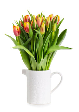 Bouquet of red and yellow tulips  in a white pot
