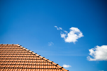 new red tiles roof and blue sky