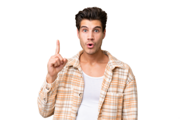 Young handsome caucasian man over isolated background intending to realizes the solution while lifting a finger up