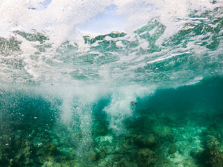 abstract underwater background of clear blue tropical sea