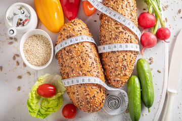 Tasty ingredients for sandwich with lettuce, tomato and peppers.