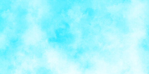 Beautiful and cloudy sky blue watercolor background, blurred and grainy Blue powder explosion on white background, Classic hand painted Blue watercolor background for design.	