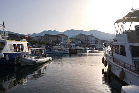 fishing port of the coastal town of Macinaggio at sunset Corsica. France