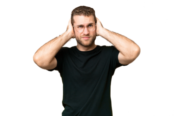 Young handsome blonde man over isolated chroma key background frustrated and covering ears