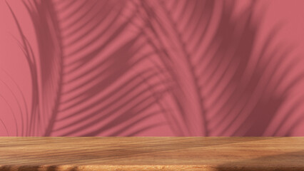 Wooden table with red stucco wall background with window light and palm leaves shadow. Product presentation mock up. Empty interior design concept