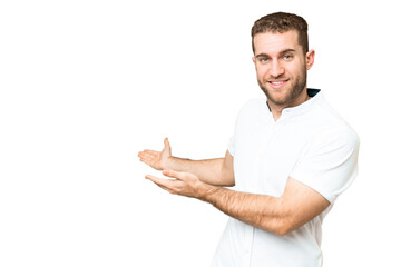 Young handsome blonde man over isolated chroma key background extending hands to the side for inviting to come