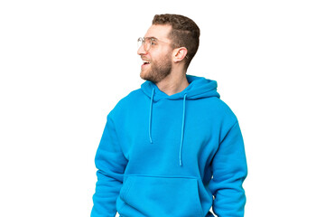 Fototapeta premium Young handsome blonde man over isolated chroma key background laughing in lateral position