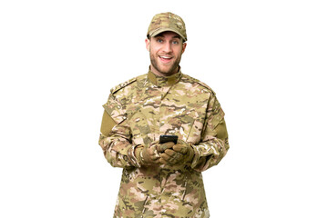 Military man over isolated chroma key background surprised and sending a message