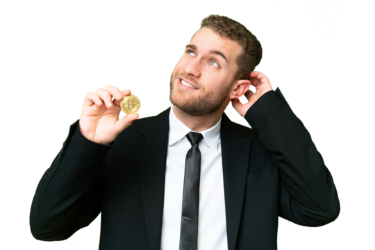 Young business blonde man holding a Bitcoin over isolated chroma key background having doubts