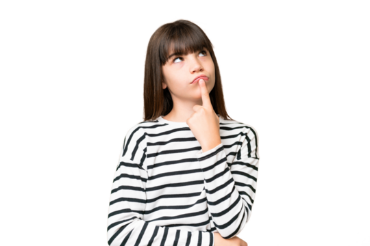 Little caucasian girl over isolated background having doubts while looking up
