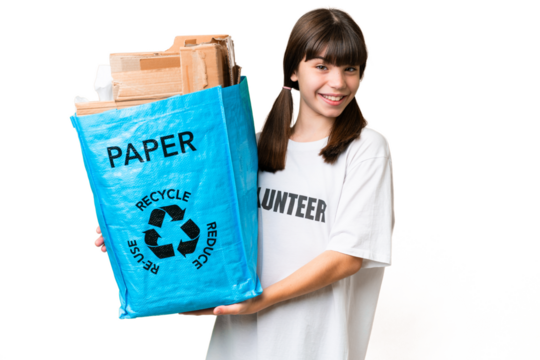Little Caucasian girl holding a recycling bag full of paper to recycle over isolated background with happy expression - Powered by Adobe