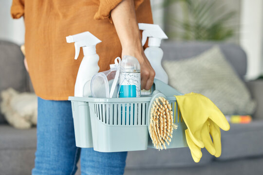 Woman, hand or cleaning bucket of housekeeping product, hotel maintenance or home healthcare wellness. Zoom, cleaner or maid worker with container, spray bottle or scrub brush for hospitality service