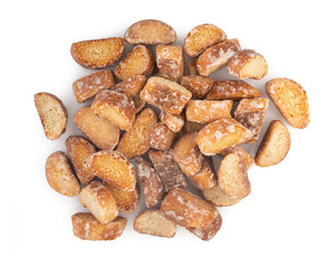 Heap of little crispy rusks in sweet sugar glaze isolated on white background, close up, top view.