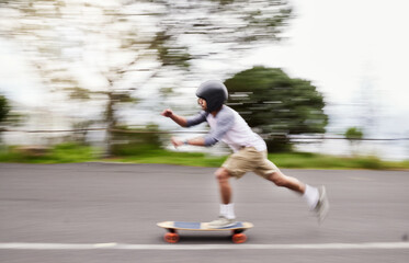 Skateboard, motion blur and man speed on road for sports competition, training and exercise in...