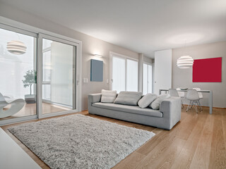 interior of a modern living room and dining room with parquet floor