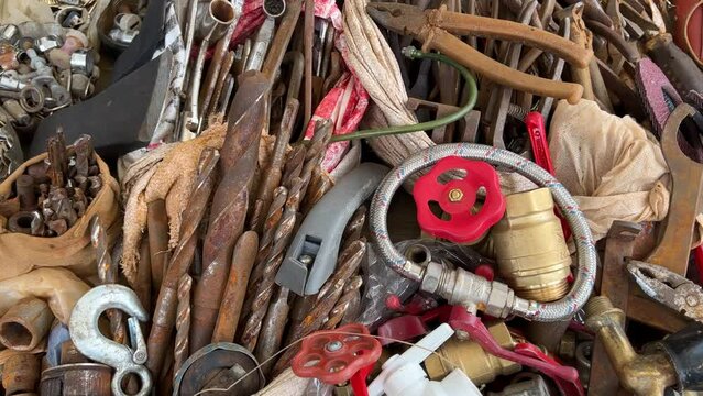 A flea market of old rusty things and tools.