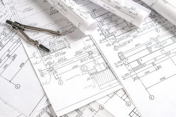 Architects concept, engineer architect designer freelance work on start-up project drawing, construction plan architect design working drawing sketch plans blueprints and making construction model