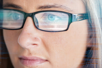 Face, vision and glasses with code, woman in business and programming, data analysis and information technology. Digital overlay, serious female and focus, coding and software development reflection