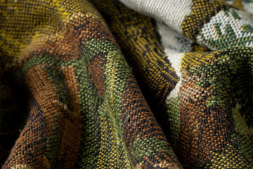 Close up view of antique piece of handmade carpet, textile detail
