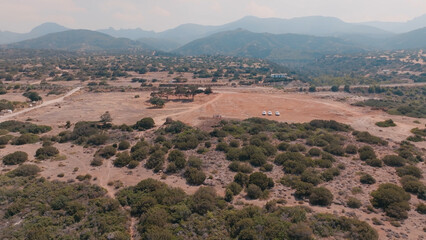 A group of people visit lands in Esentepe, North Cyprus on sunny day