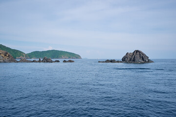 Fototapeta premium Sailing the sea. Seascape with rocks at blue sea. Travel by Thailand.