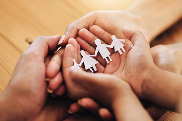 Hands, family and paper cutout, support and connection, link and bonding, foster care and adoption....
