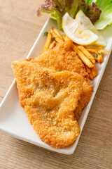 fish and chips - fried fish fillet with potatoes chips