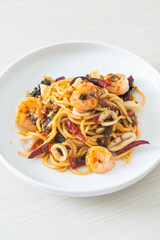 spicy spaghetti seafood on plate