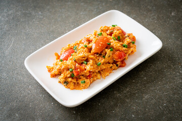 Stir-fried tomatoes with egg or Scrambled eggs with tomatoes