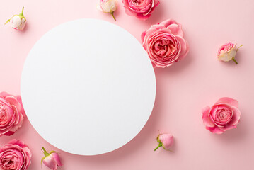 Fototapeta na wymiar Mother's Day concept. Top view photo of white empty circle and fresh flowers pink peony roses on isolated pastel pink background with empty space