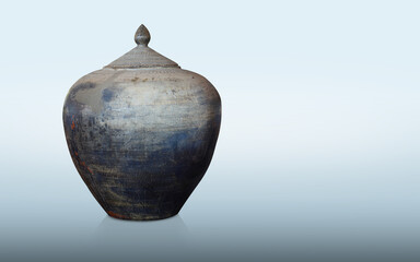 antique and old blue and black clay pot and lid on blue background, vintage, object, decor, copy...