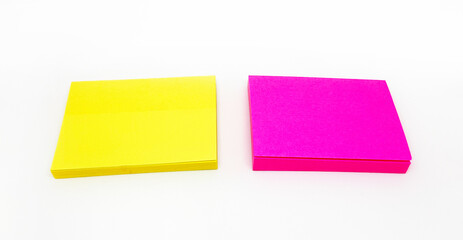 Colorful or multicolor post it isolated on white background. Yellow and pink paper for writing message, idea, notice, memo or information.