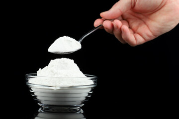 The protein powder is taken with a spoon