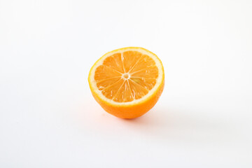 Fresh lemon on a white background.  Close-up photo